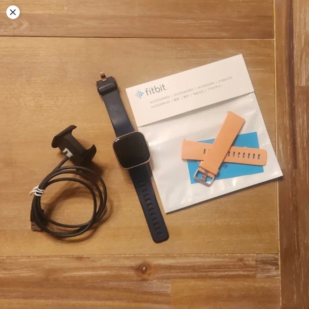 Fitbit Versa 2 with charger and new band